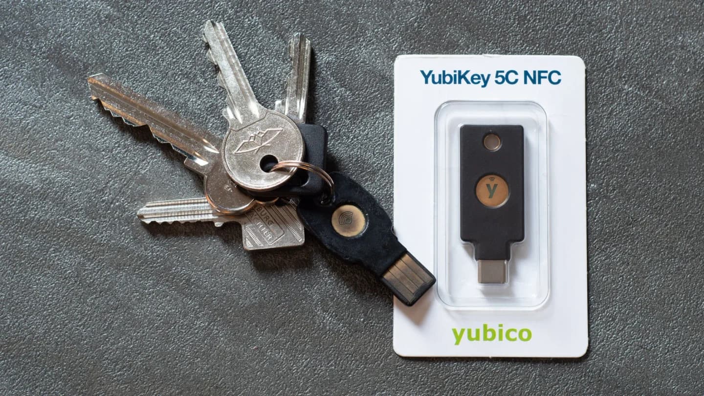 A packaged YubiKey 5C NFC beside a set of keys.