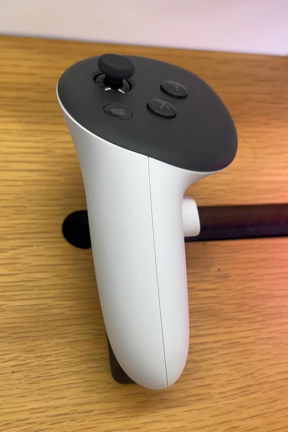 A close view of the left Touch Plus controller for Meta Quest 3.