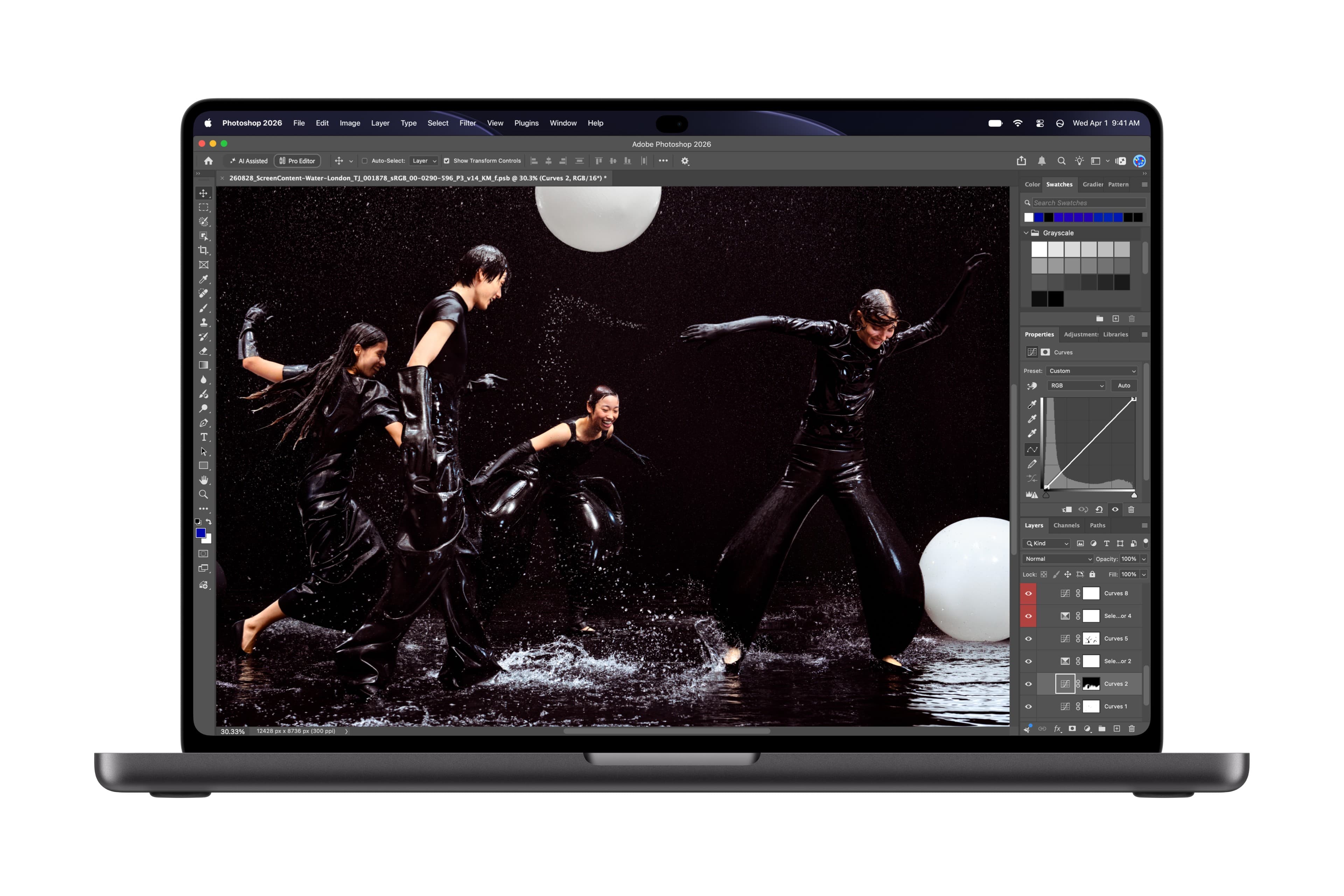 MacBook Pro PROLED XDR hiển thị Adobe Photoshop trong ảnh demo sản phẩm Apple ngày 28/10/2026
