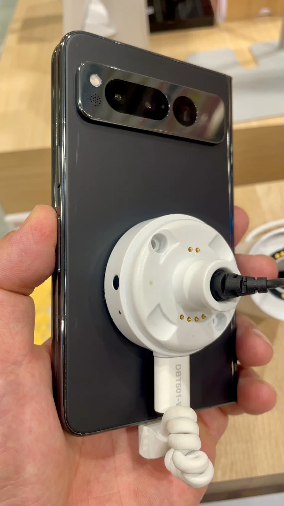 The rear panel and camera bar of a Google Pixel Fold on display.